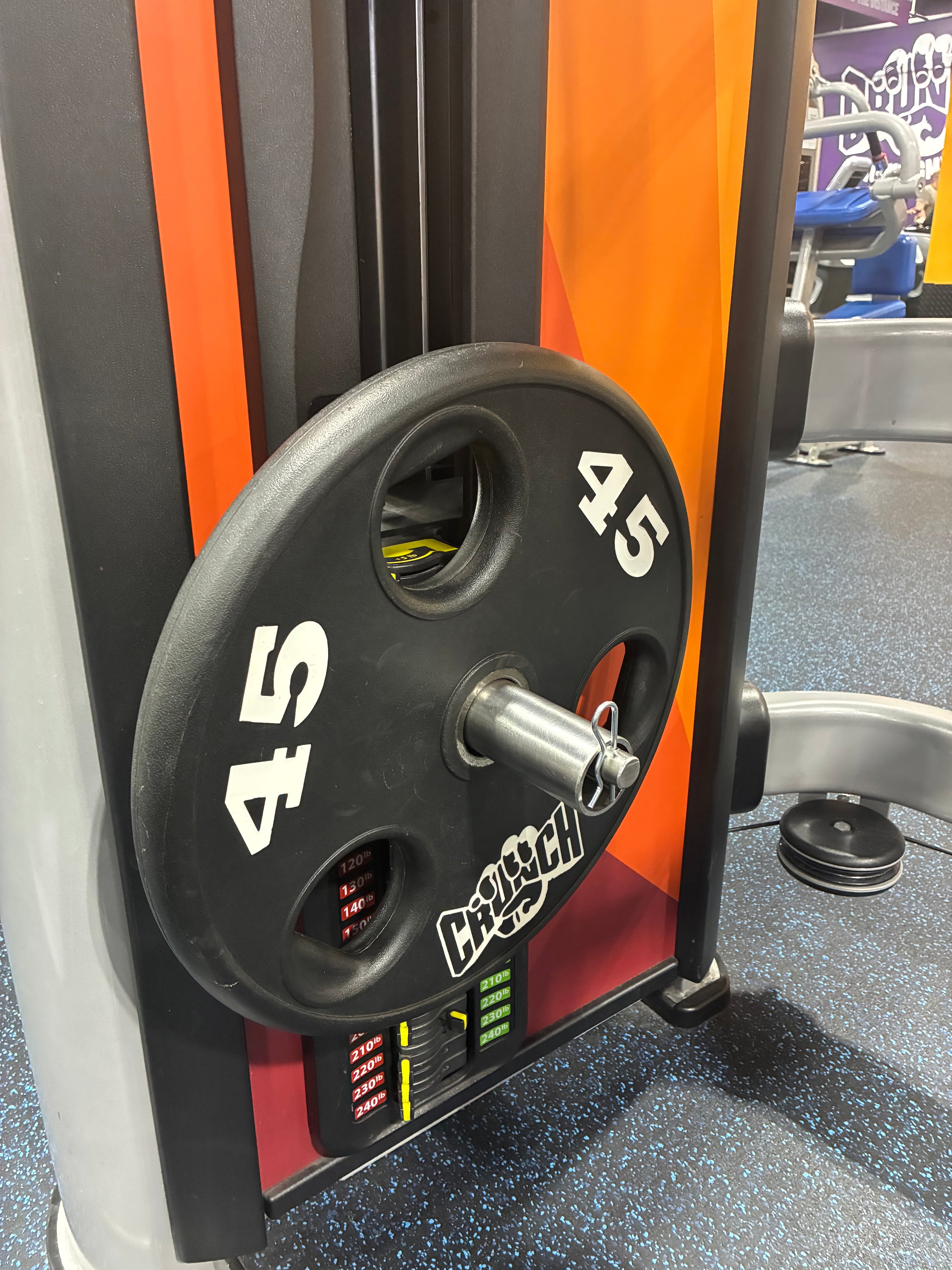 Modular gym pin installed on a pin-loaded machine for weight stack overloading