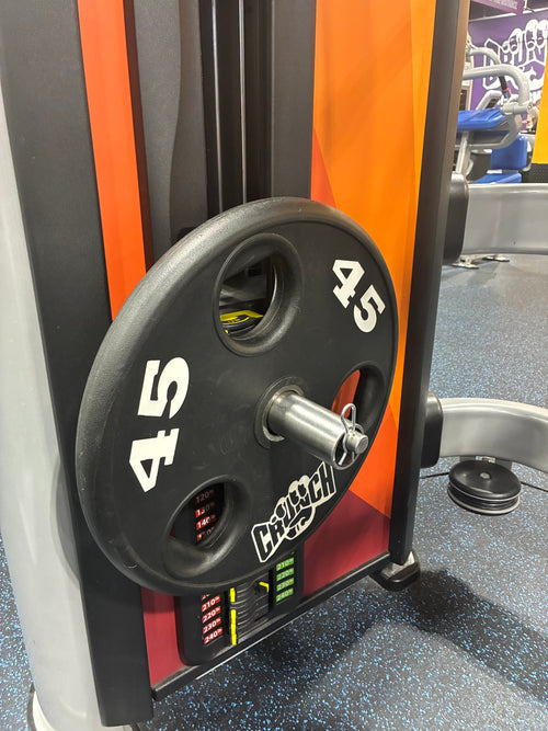 Modular gym pin installed on a pin-loaded machine for weight stack overloading
